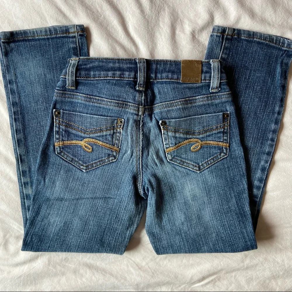 Justice Jeans 7R Simply Low boot cut blue Jeans. No stains or holes. Medium blue